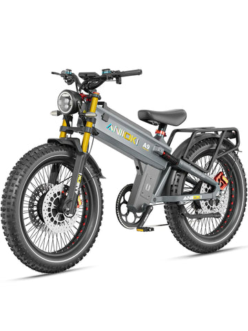 The gray Aniioki A9 Pro Max 70Ah electric mountain bike, engineered for long range adventures with its massive battery capacity.
